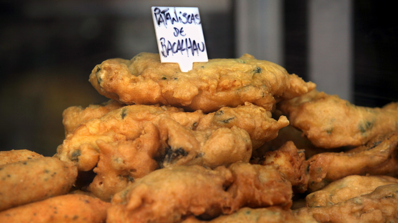 Pile of deep-fried bacalhau at market