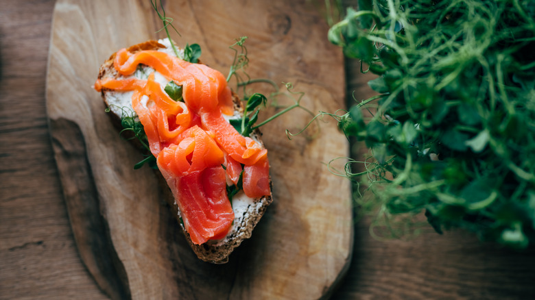 Lox on slice of bread with cream cheese