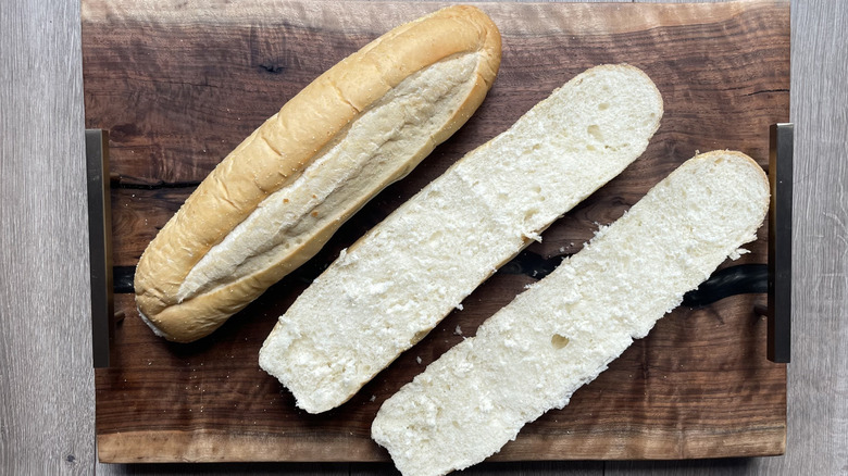 Two loaves of white sub rolls