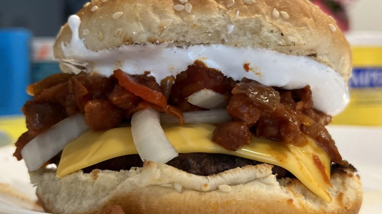 Burger with Fluff, chili paste, cheese, and onions