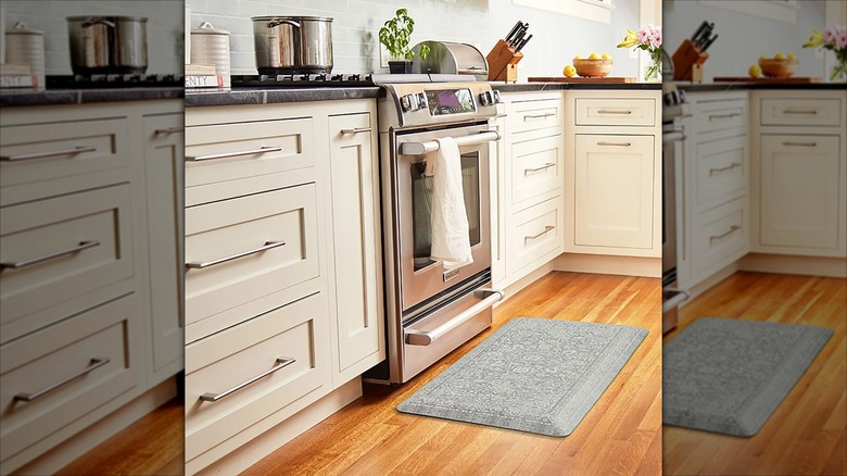 Gray Persian anti-fatigue kitchen mat in front of stove