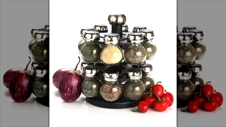 2-tiered spice rack surrounded by veggies
