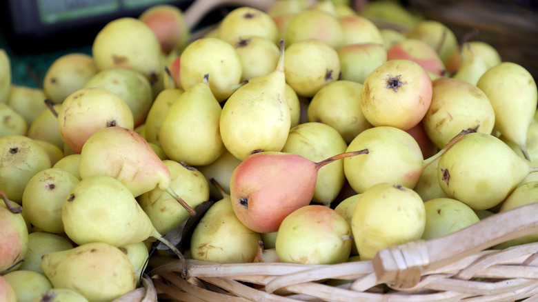 Pears in baskets at grocery store