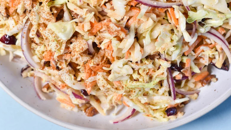 Close up of cranberry-pecan slaw in bowl