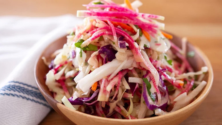 Bowl of slaw with pink watermelon radish