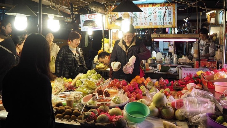 Man preparing food at Ningxia Night Market stall