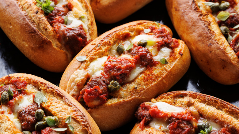 Meatball sub in crusty bun with a horizontal split at the top