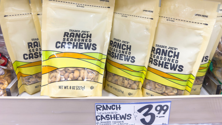 Bags of Trader Joe's Ranch Seasoned Cashews on store shelf