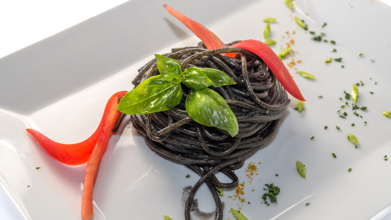Squid ink pasta with basil