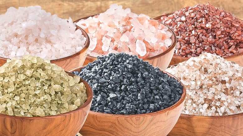 various salts in wooden bowls
