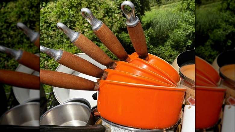 Vintage set of five nested Le Creuset saucepans