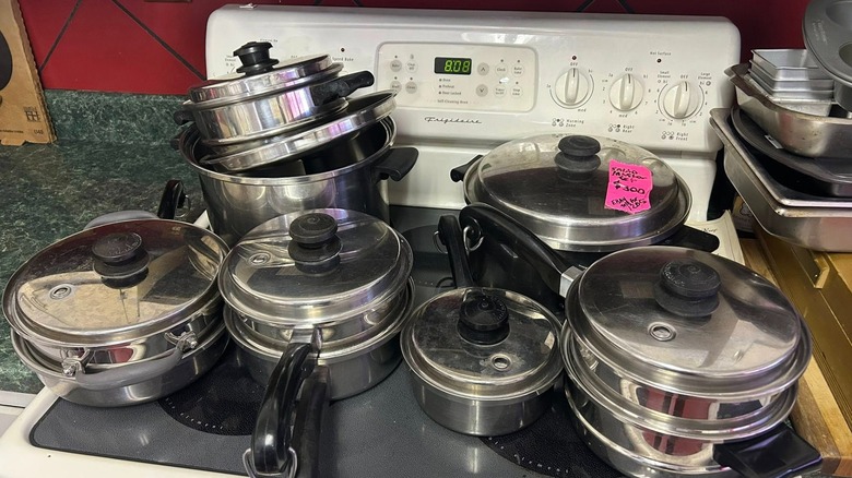 Vintage set of Salad Master waterless cookware on stovetop
