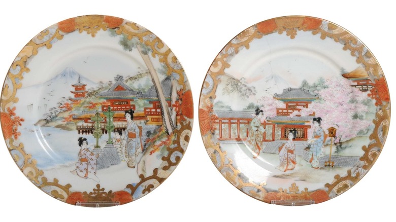 Two Kutani plates with Japanese village scenes from the Meiji period
