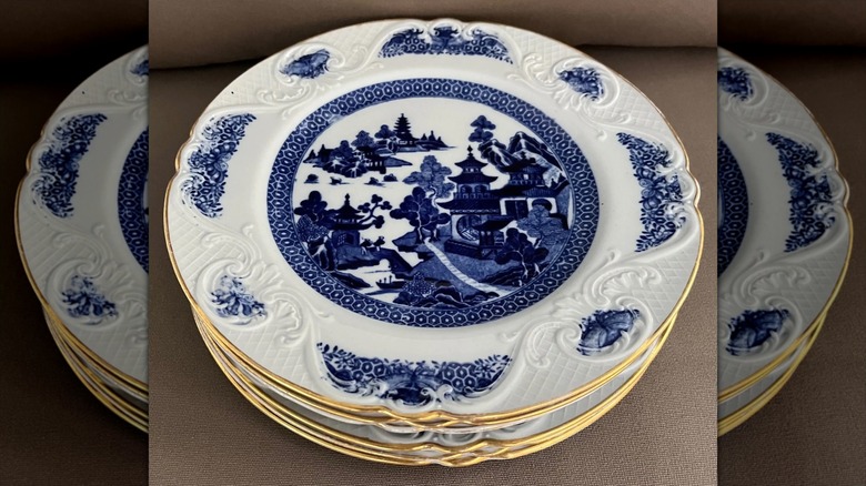 Stack of six Blue Willow Spode plates from the late 1800s