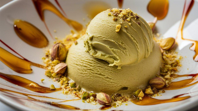 A scoop of pistachio gelato in a bowl