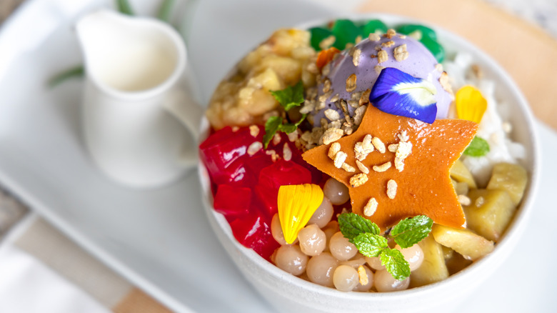 Filipino halo-halo in a bowl with various colorful toppings
