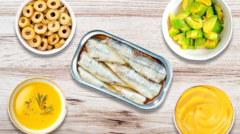 Sardine cans and various ingredients