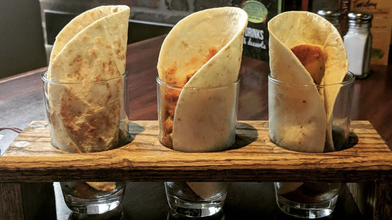 Tacos served in glassware
