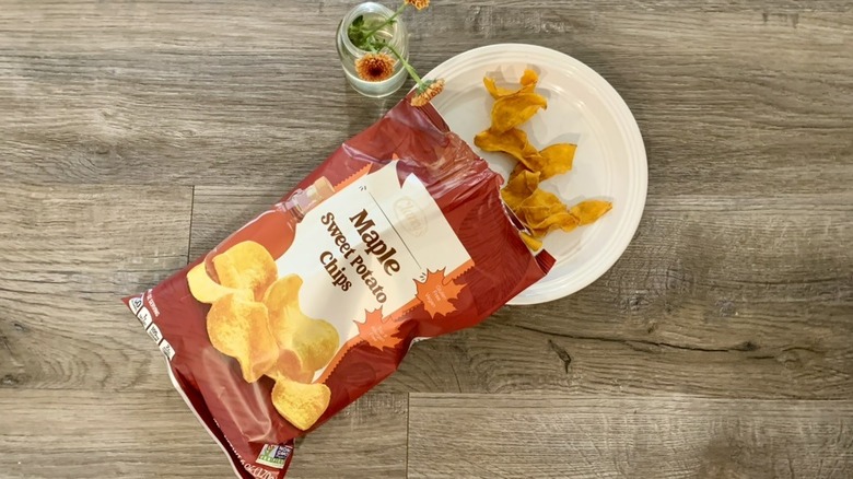 Open bag of Aldi Maple Sweet Potato Chips on a plate