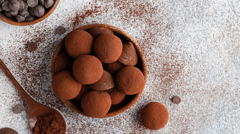A bowl of chocolate truffles