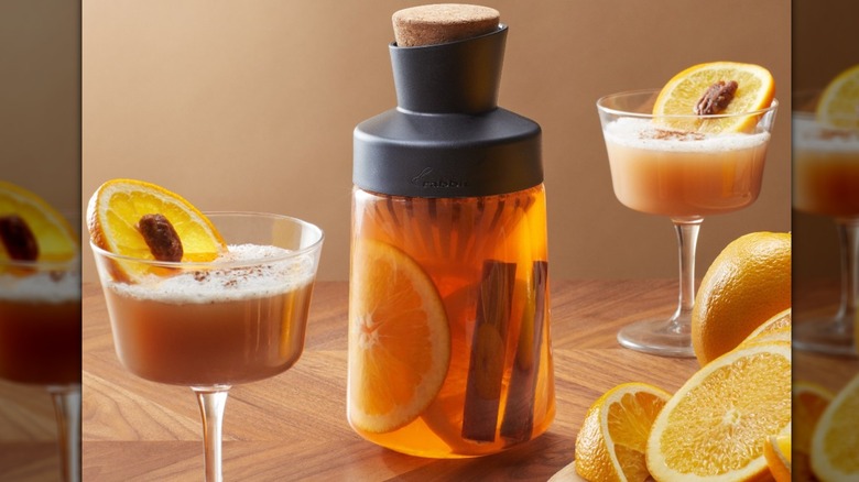 Rabbit Liquor Infusing Decanter filled with orange slices and cinnamon