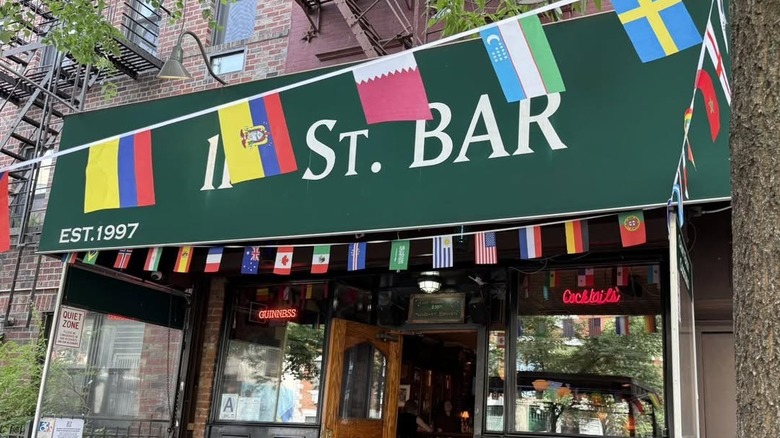 11th St. Bar Sign with flags of the world