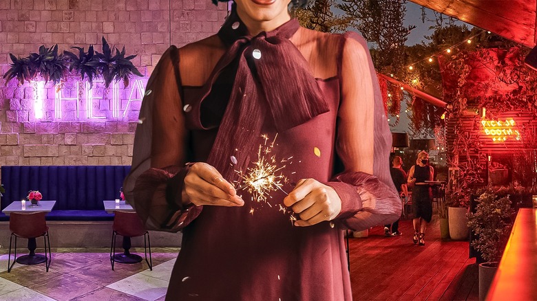 woman celebrating with sparklers