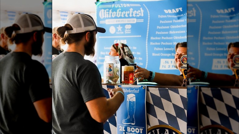 person getting their stein filled at Fulton Oktoberfest