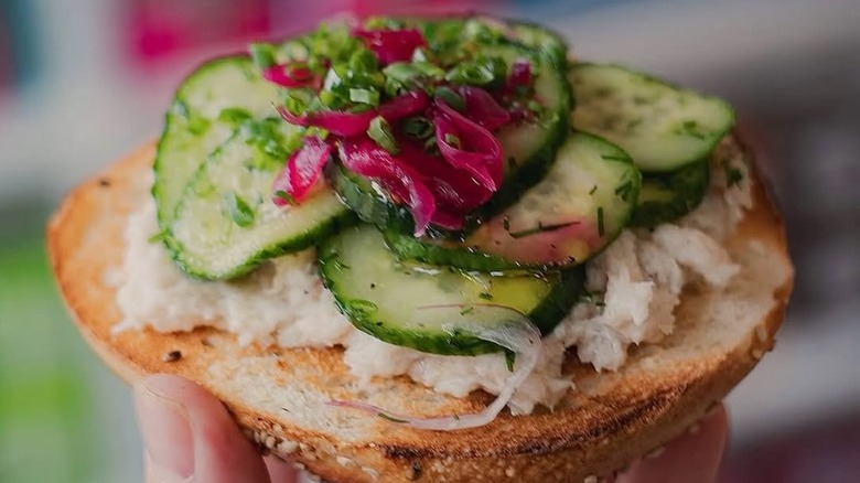 bagel with pickled cucumbers