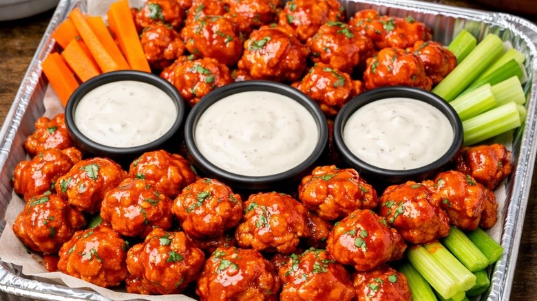 Platter with vegetables and dips
