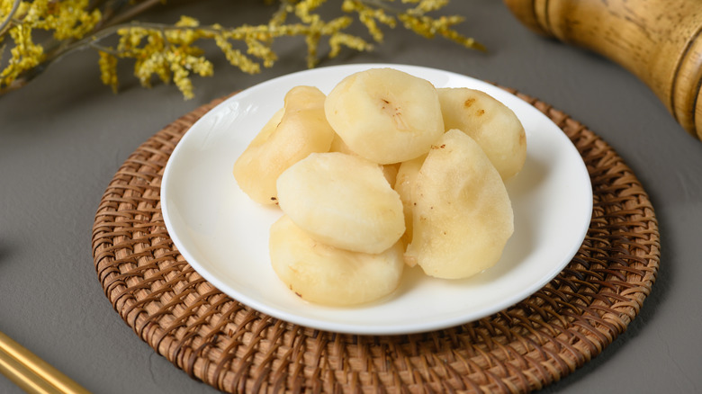 water chestnuts on a white plate