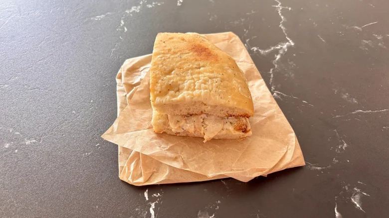 Chicken Bacon Rancher sandwich from Panera on paper