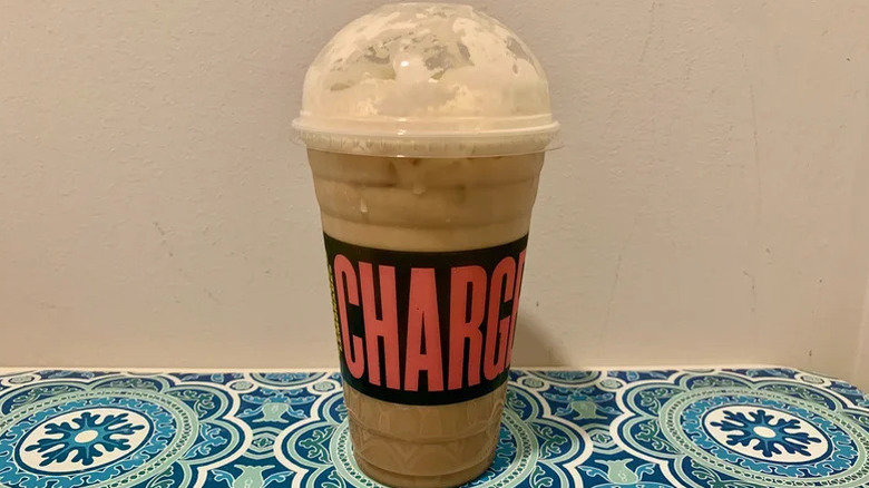 Panera Madagascar vanilla latte close up in a plastic cup