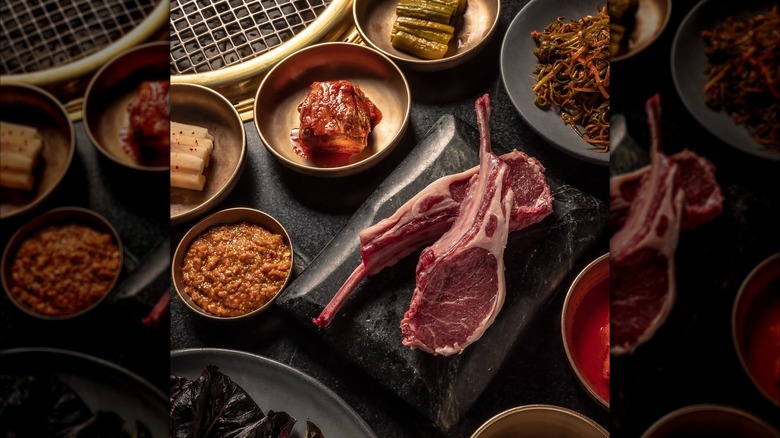 table at Cote Korean Steakhouse filled with various foods