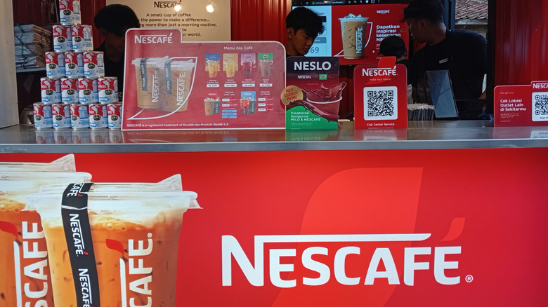 A Nescafe coffee bar stand.