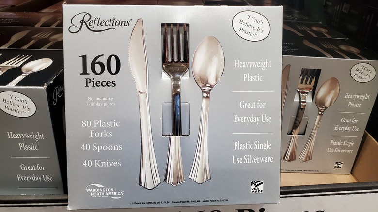 A box of Reflections plastic silverware on the shelf at Costco
