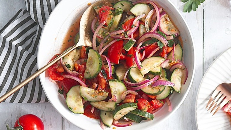 Cucumber tomato salad in a bowl