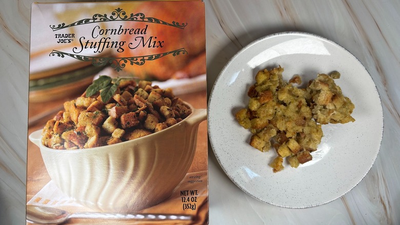 Trader Joe's Cornbread Stuffing Mix next to packaging on marbled surface