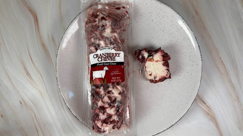 Trader Joe's Cranberry Chevre Goat Cheese next to packaging on white plate