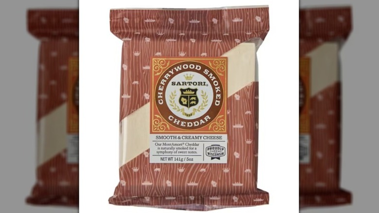 Sartori cherrywood smoked cheddar on a white background