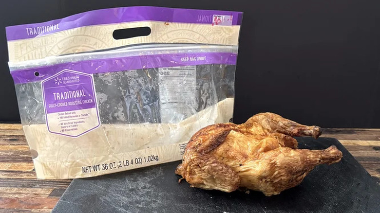 Whole Walmart rotisserie chicken on a cutting board and bag