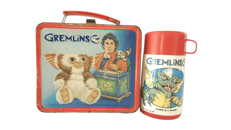 Product shot of a "Gremlins" lunchbox and thermos from 1984