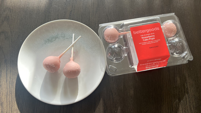 Bettergoods strawberry cake pops on a plate.