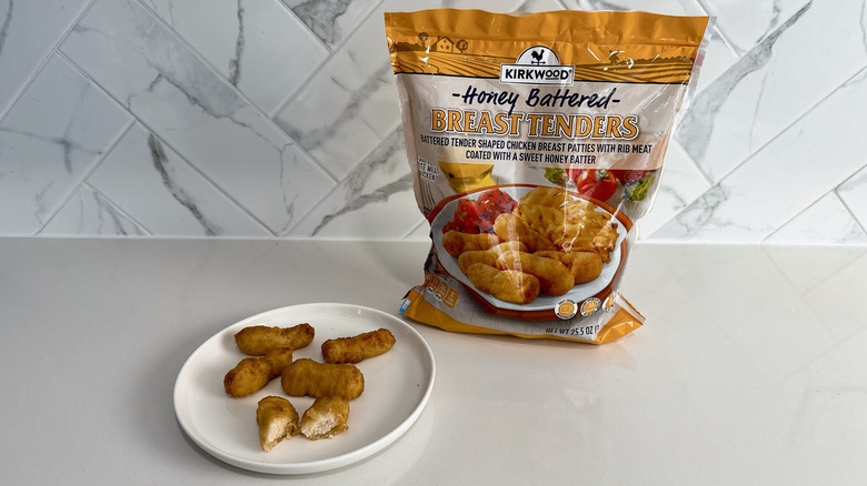 Kirkwood honey battered breast tenders on a plate with product bag alongside