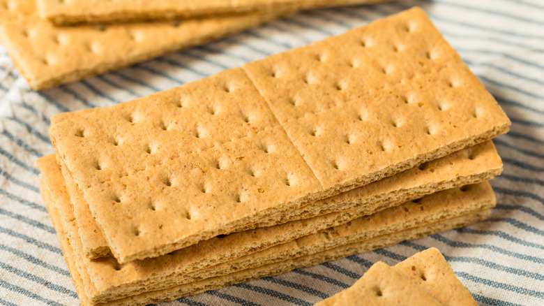 Graham crackers stacked on dishtowel