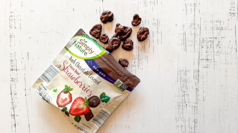 Dark chocolate-covered freeze-dried strawberries in a baggie