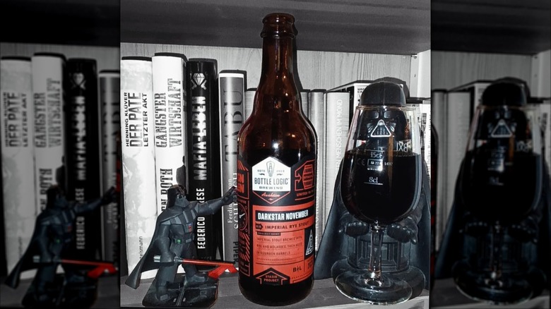 Bottle of Darkstar November surrounded by Star Wars figures