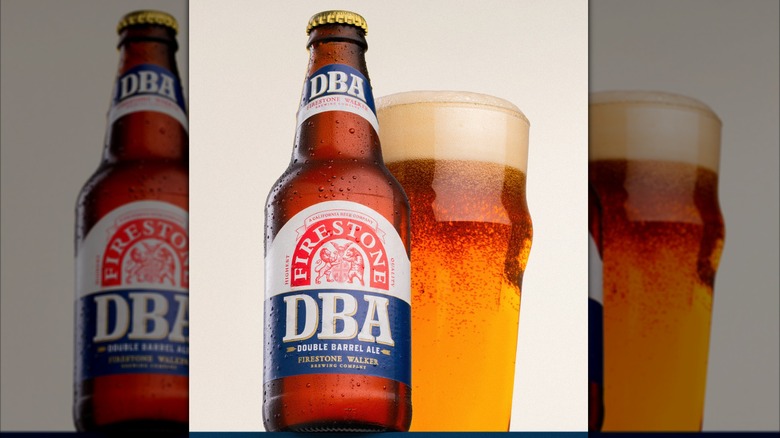 Bottle of DBA next to a full glass