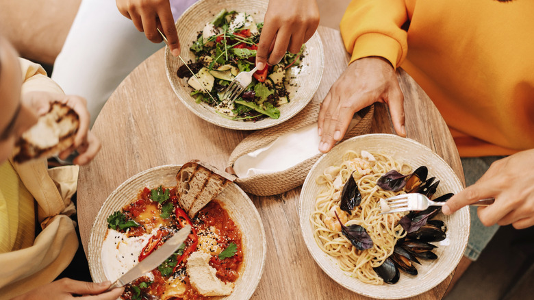 people sharing an Italian meal