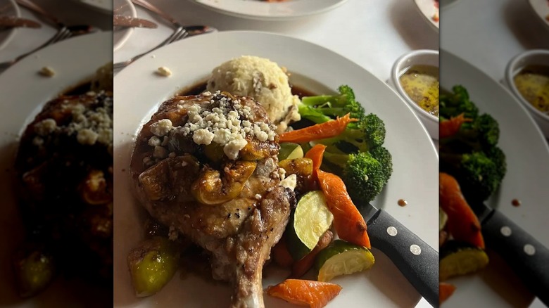 a pork chop dish with veggies